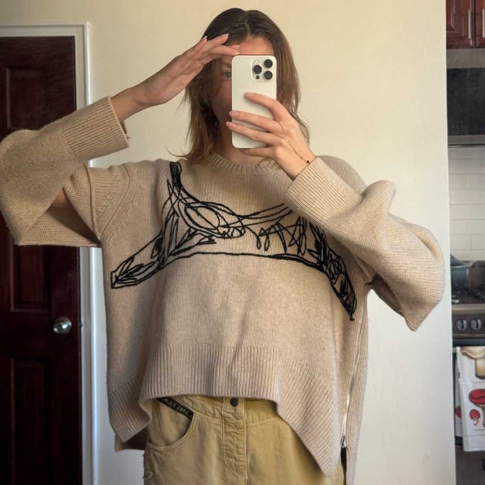 Carol Chugani cashmere sweater with fashionable icon design